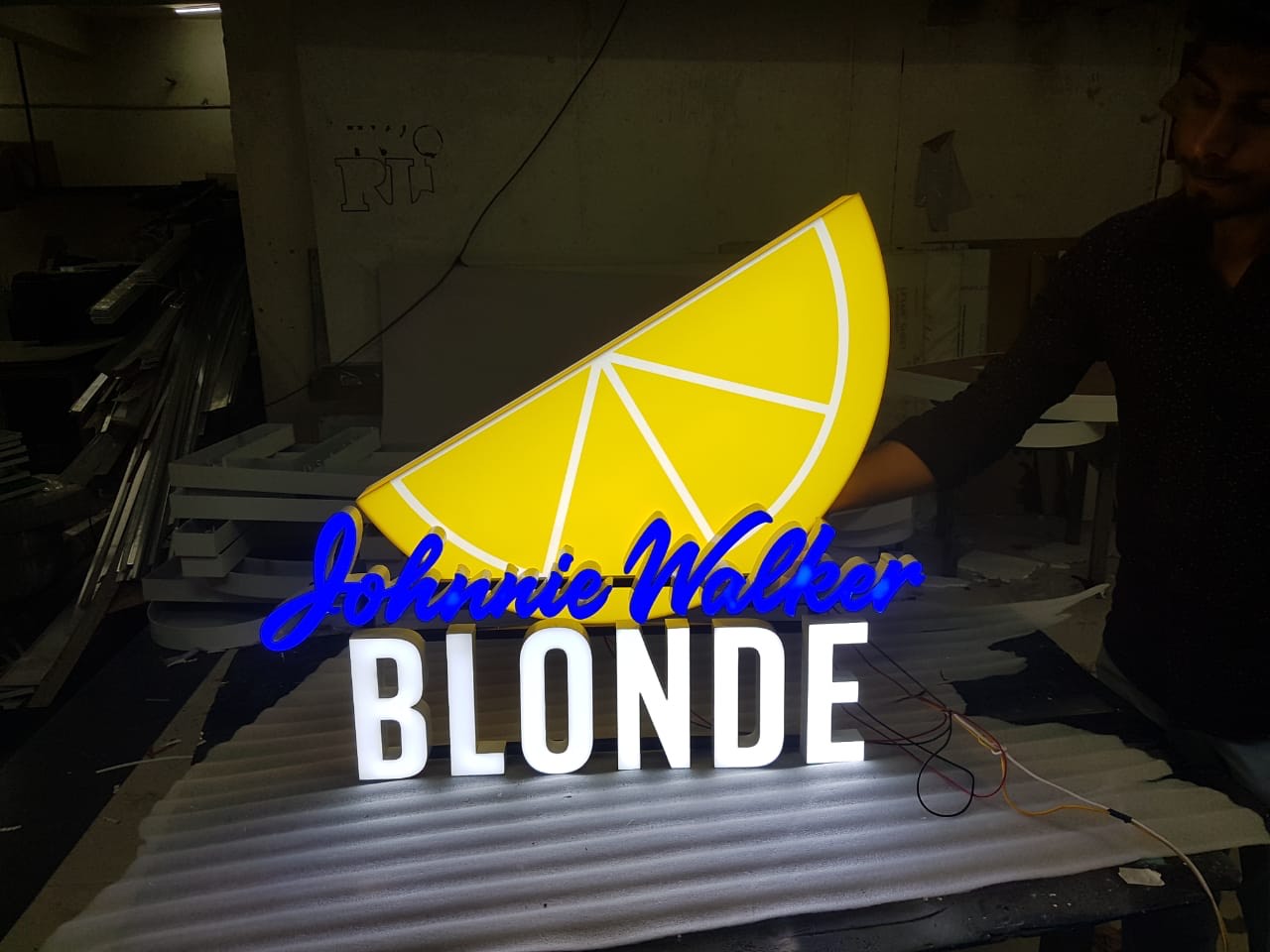 Illuminated sign fabrication — in-workshop production