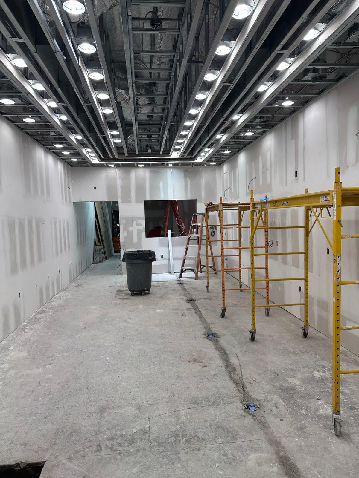 Restaurant bar area — warm lighting, completed interior